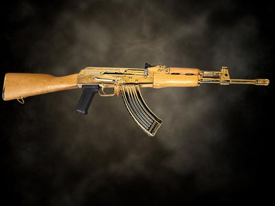 Full side view of the custom 24K Gold Plated Century AK-47 rifle with wood furniture and gold magazine.