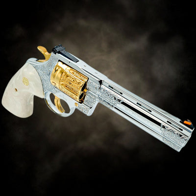 Custom Colt Anaconda 6-inch .44 Magnum revolver, scroll engraved with 24K gold cylinder and white grips.
