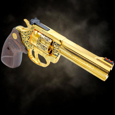 Custom Colt King Cobra 4-inch revolver, fully 24K gold plated with Colt Heritage scroll engraving and rosewood grips.