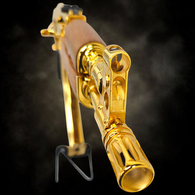 Full view of the custom Draco AK Pistol fully plated in 24K gold with a matching gold magazine.