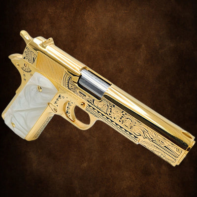Custom Rock Island 1911 .45 ACP pistol with "Mayan Aztec" engraving and full 24K gold plating.