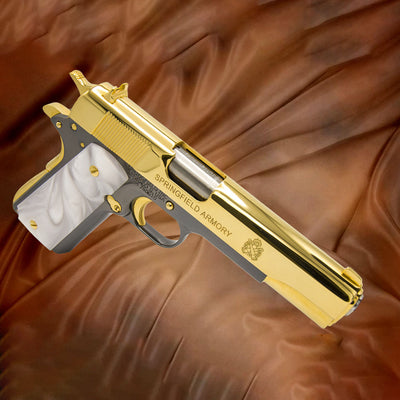 Custom Springfield 1911 Mil-Spec pistol with 24K gold accents and black chrome finish.